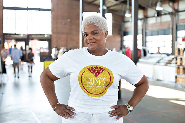 LaShonda Sims leads her all-female, family-run business, Ruby's Natural Hair Care.