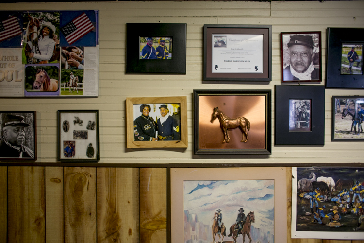  Poster and photographs hanging at the Buffalo Soldiers Heritage Center
