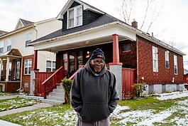 Kenny Tanner stands in front of his home on Mount Vernon Street.