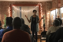 Cornetta Lane speaks at an event at Submerge Records in the North End