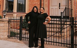 Photo caption: Sisters Roderica and Francina James pose outside their luxury bed and breakfast.  Courtesy photo.