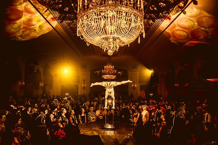 Thousands of elaborately costumed guests gather at Masonic Temple each year to immerse themselves in decadent sets and thrilling performances at Theatre Bizarre.