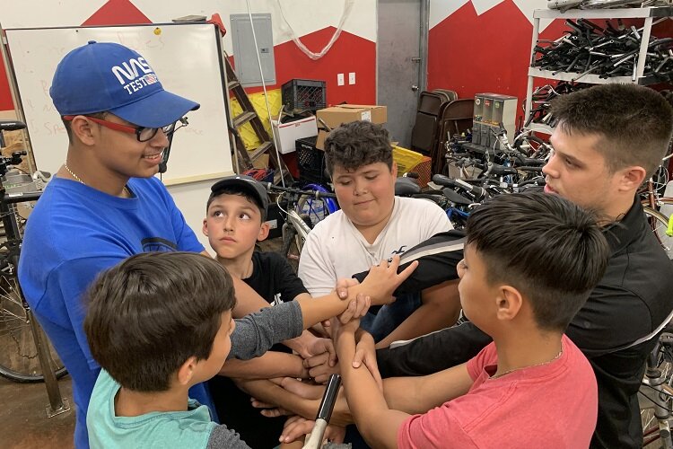 UNI youth learn bike repair at Southwest Rides.