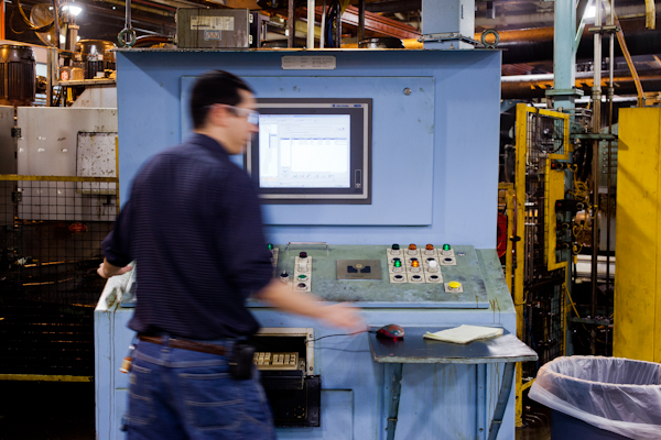 controls engineer, Paul Tousignant, mainaining production line at Detroit Diesel