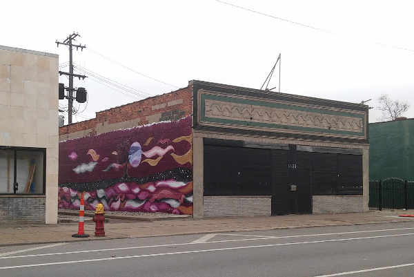 A mural painted by returning citizens on a Michigan Avenue commercial building