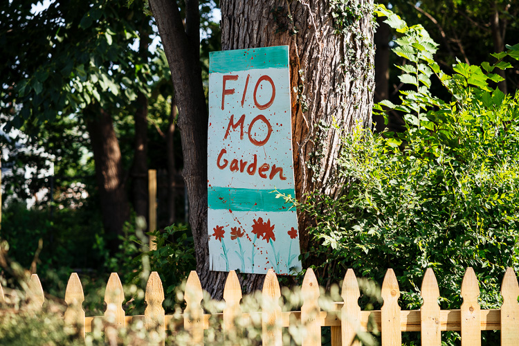 Painted sign at Mo-Flo Community Garden