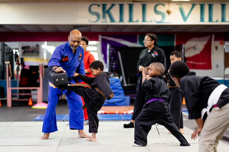 Kids learning karate at Skills Ville