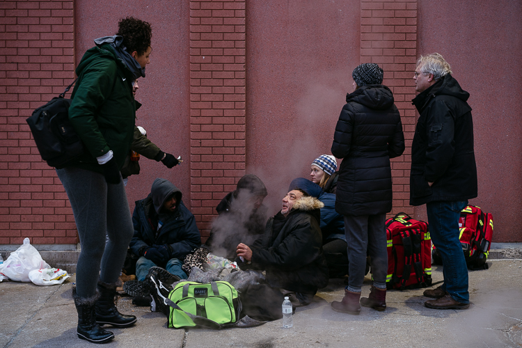 Detroit Street Care helps a group of four homeless people in Greektown