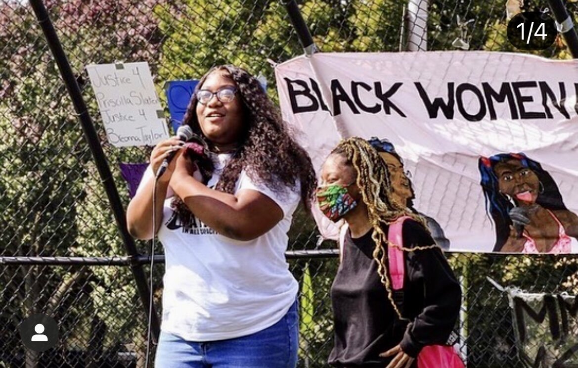 Eva Olieta and Ama Russell demonstrate as Black Lives Matter in All Capacities.