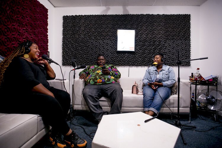 "Damsels in Detroit" host Evann Webb (right) records an episode of her podcast at Audio Wave Network's studios on the east side of Detroit. Pictured with her are co-founders of Detroit Hives  Timothy Paule and Nicole Lindsey.