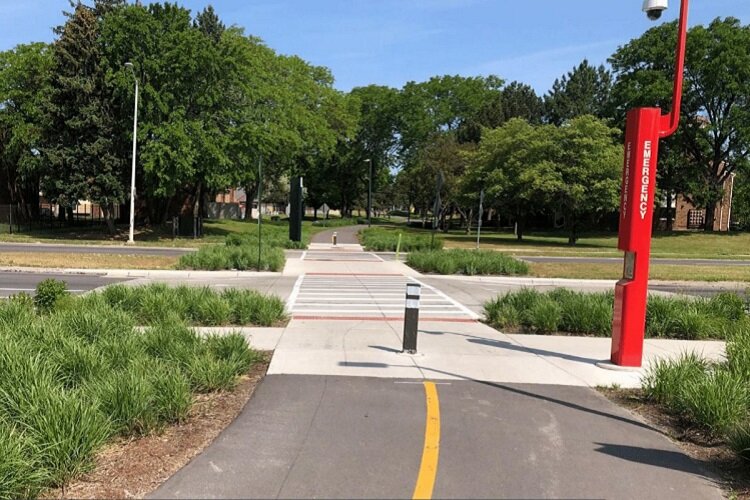 The Dennis Archer Greenway features mile markers and emergency stations.