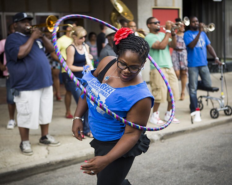 The Sidewalk Festival forgoes traditional stages, instead using streets, gardens, and alleys to showcase local art and talent.