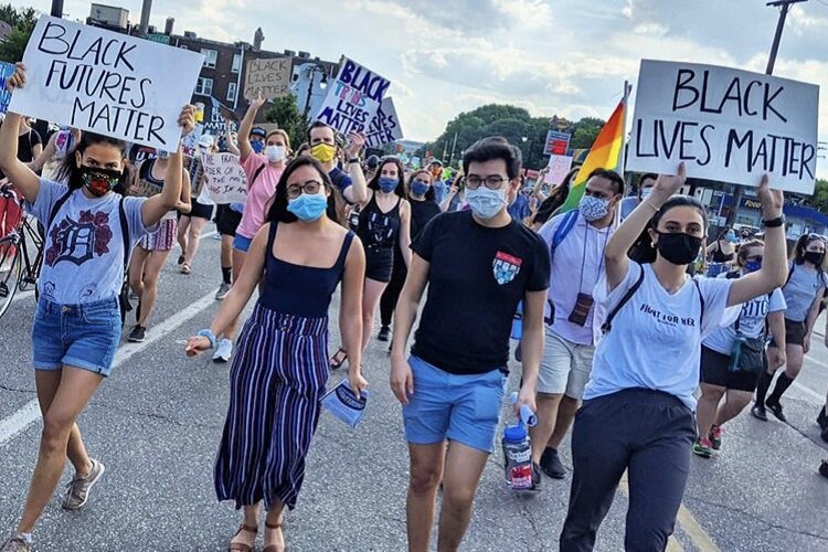 CoC Youth participate in a march for racial justice.