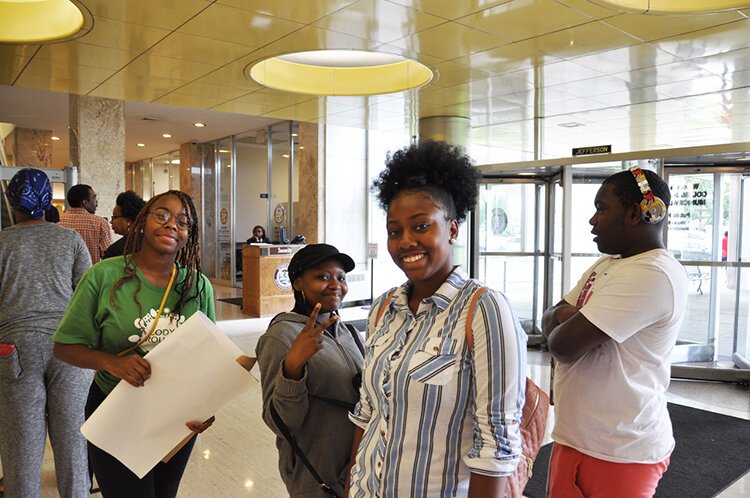 Aziyah Cole, Khadijah Harris, Skylah Pounds, and Rodney Bridges at city hall.