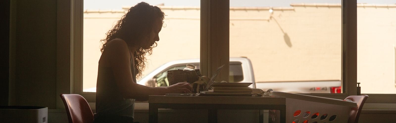 Betsy Palazzola gets some work done at The Commons.