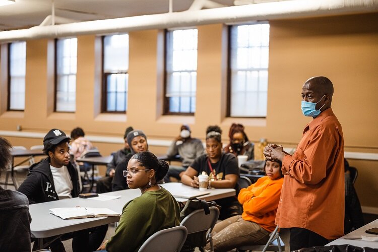 Pastor Barry addresses a gathering of young entrepreneurs at COTM.