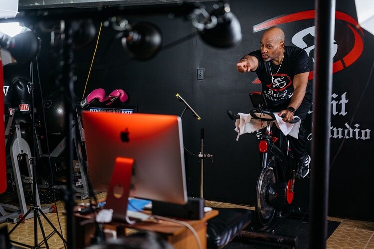 Tyronza Nesbitt streams a class for Detroit Cycling Studio members.