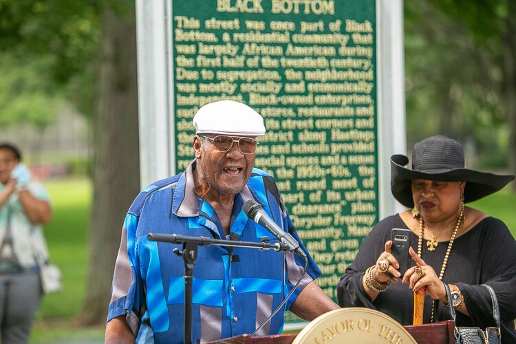 Willie McLemore regales the crowd with stories of growing up in the storied neighborhood. 