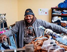 Don Lamarr, 64, looks through free clothing at FORC after getting out of prison a little over a year ago.