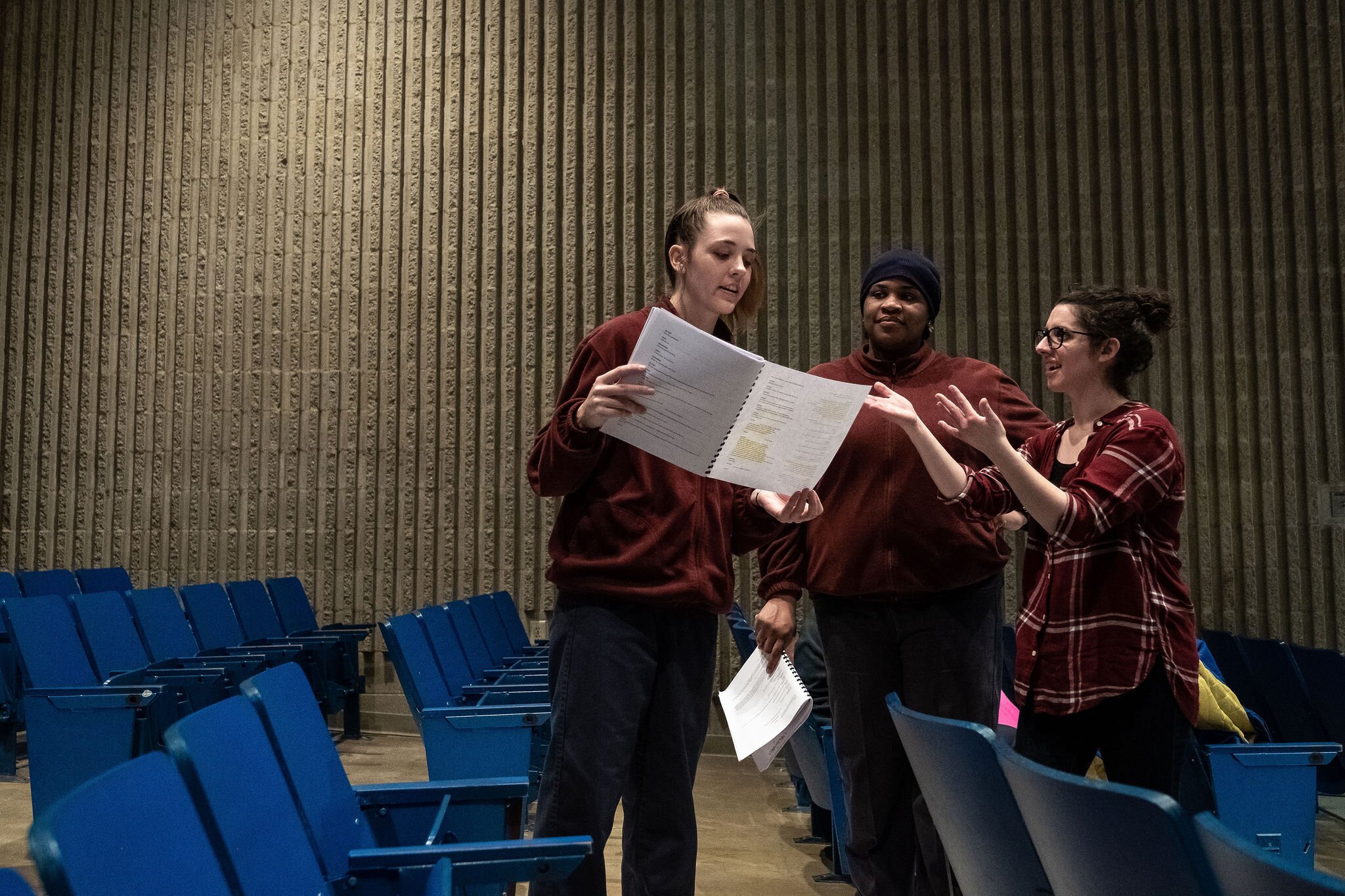 Frannie Shepherd-Bates works with the women's ensemble