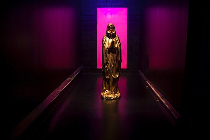 A golden Madonna welcomes visitors to Hygienic Dress League's newest art installation at Bagley Central.   