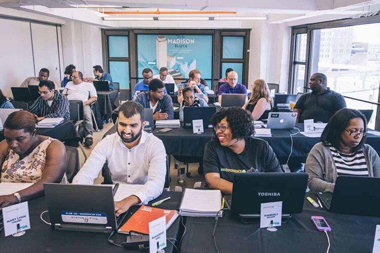 A full class learns to code during a bootcamp at Grand Circus.