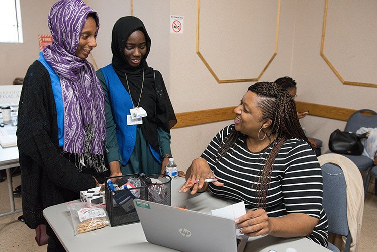 Job seekers attend West Grand Boulevard Collaborative’s job fair this past summer. Hosted in collaboration with Henry Ford Health System, the event provided attendees with information and coaching.