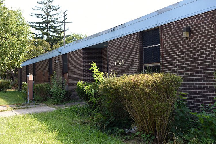 The former Hancock School includes a nearly 18,000-square-foot single-story building with an internal courtyard. 