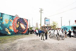 Community members, artists, and Henry Ford Health System employees gather for the open house earlier this year for ArtBlock.