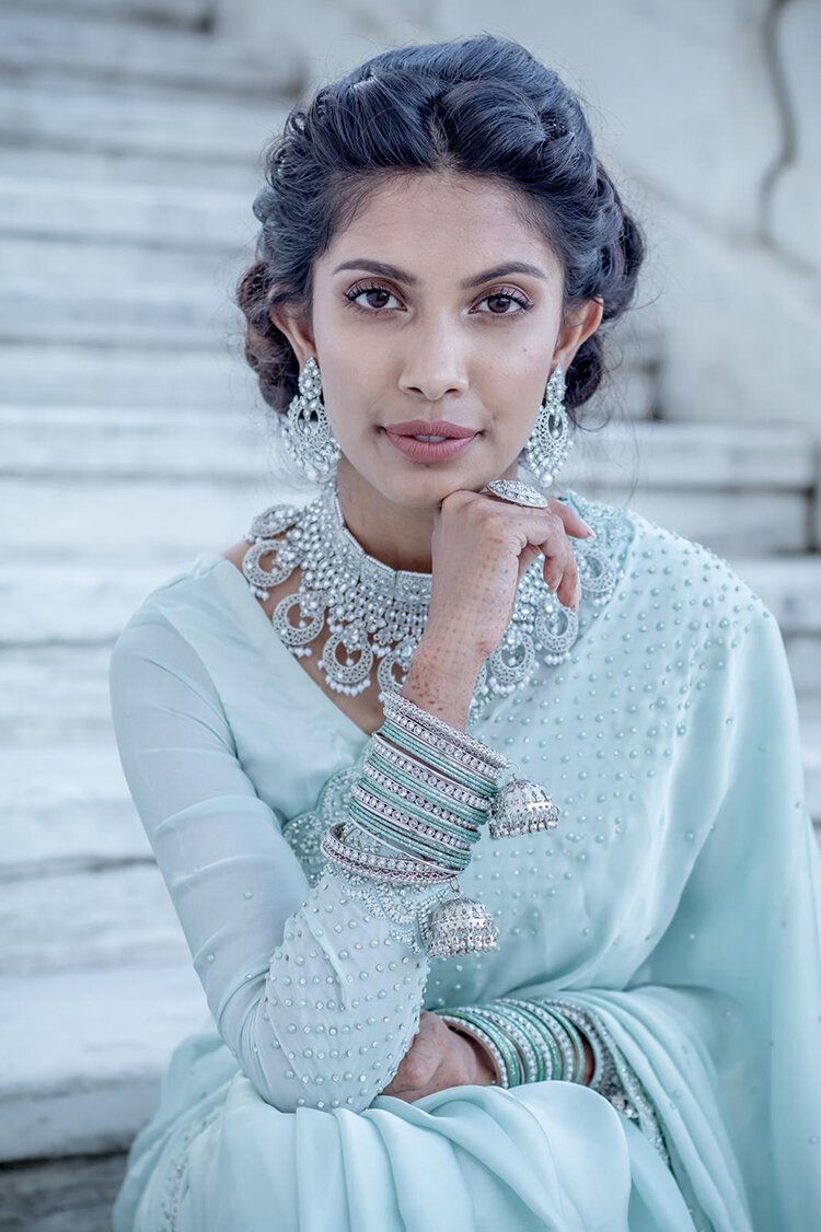 Humayra Bobby models her sister's jewelry for Festive Essentials.