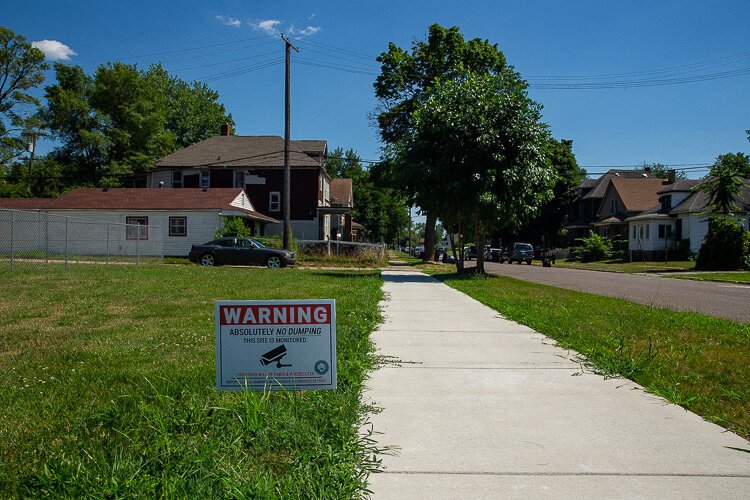 A sign warns illegal dumpers to stay away.