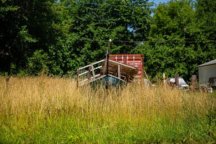 Debris dumped in an East Side field.