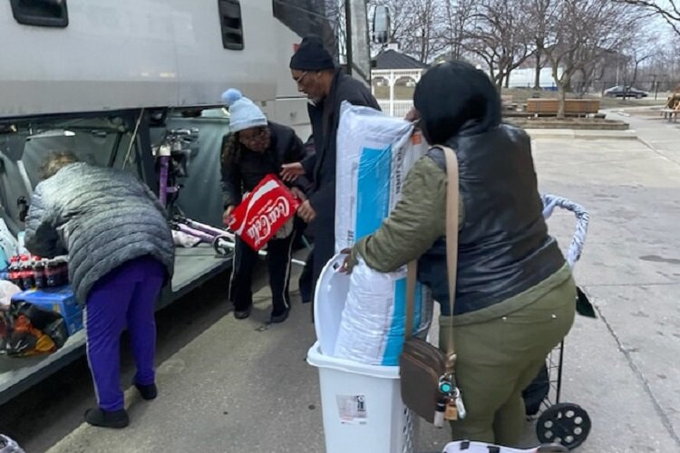 Detroit seniors board a bus for a Raising Hope event.