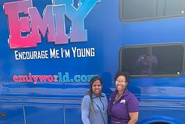 EMIY Inc. mentors pose in front of the EMIY RV.