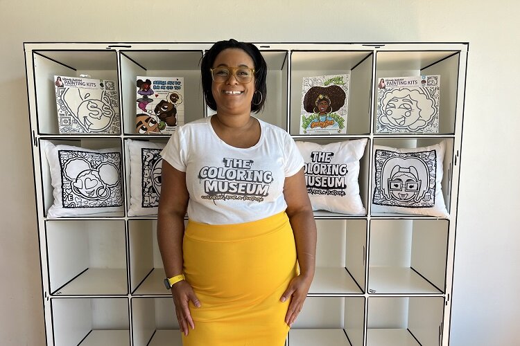 Sherrie Savage is setting up her new business, The Coloring Museum, in the Grand River WorkPlace's pop-up space.
