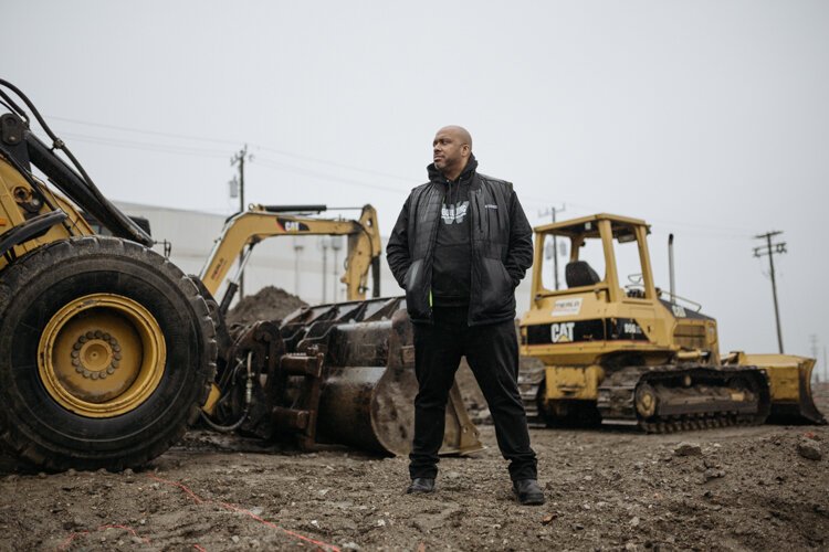 Clifford Brown of Woodborn partners stands at a construction site in SW Detroit.