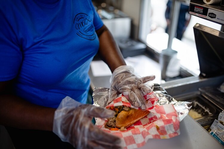 Maxine Pace, owner of Max Italian Beef food truck, readies an order.