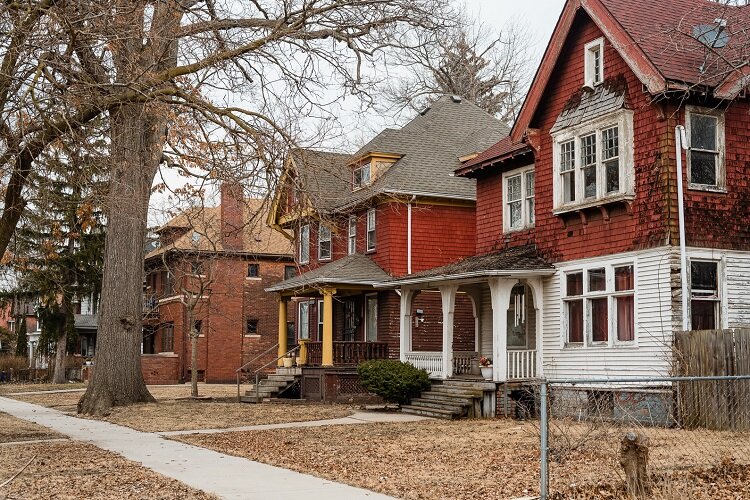 Jennine Spencer's home (left) and the family home where she grew up (right).