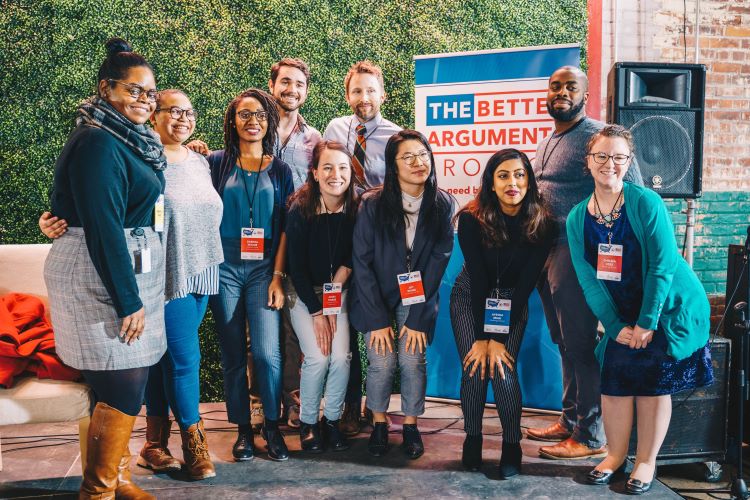 Participants in the Better Arguments event take a moment to strike a pose.