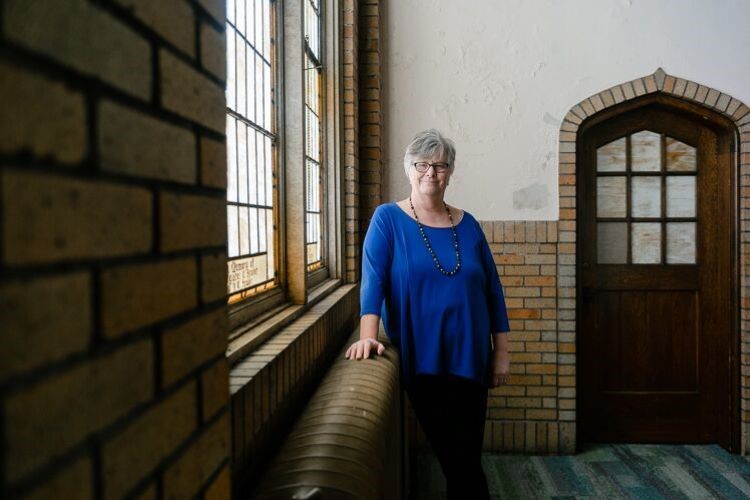 Revered Pam pictured at Hope Community Church at Jefferson Ave and Marlborough St.