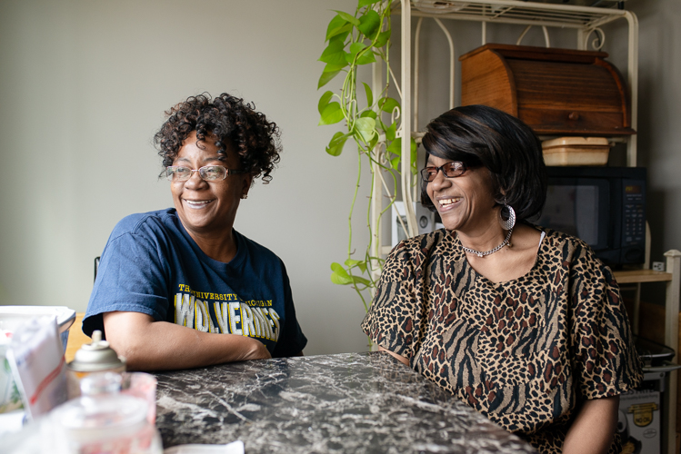 Sisters Harriet and Pam McPhail hang out in their new home.