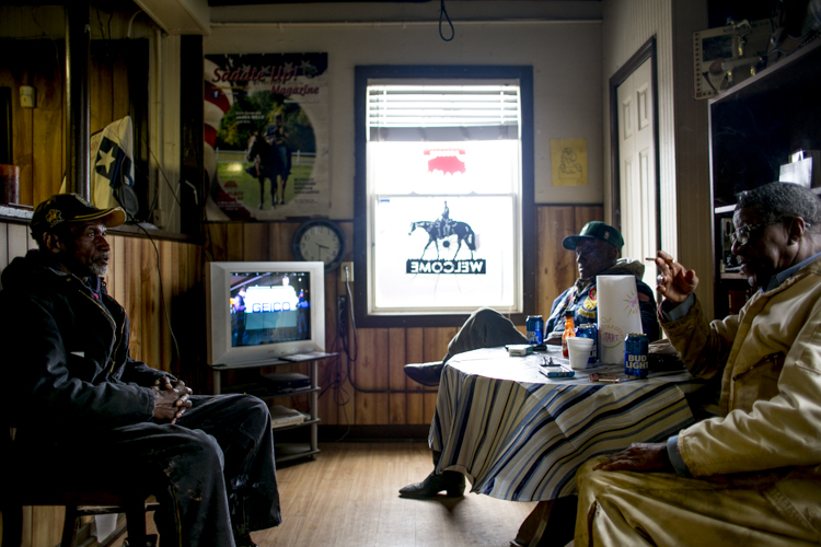 Club members sit and talk at the BHSA headquarters.