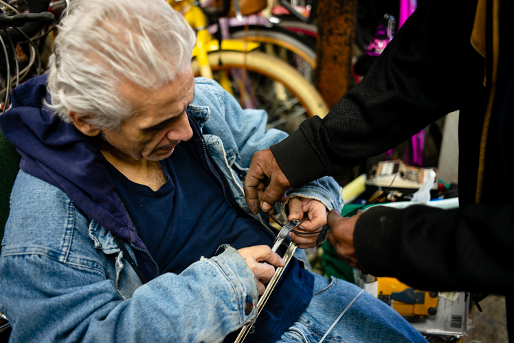 Sam Awada works on some repairs.