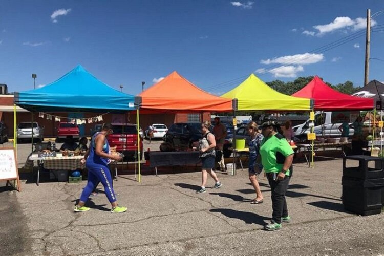 Residents get fit at the Sowing Seeds Growing Futures Farmers Market (pre-COVID).