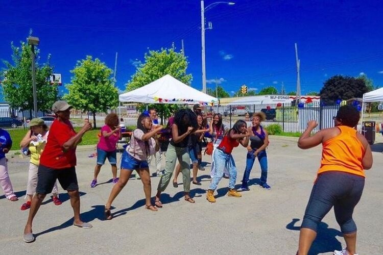 Residents get fit at the  Sowing Seeds Growing Futures Farmers Market (pre-COVID).