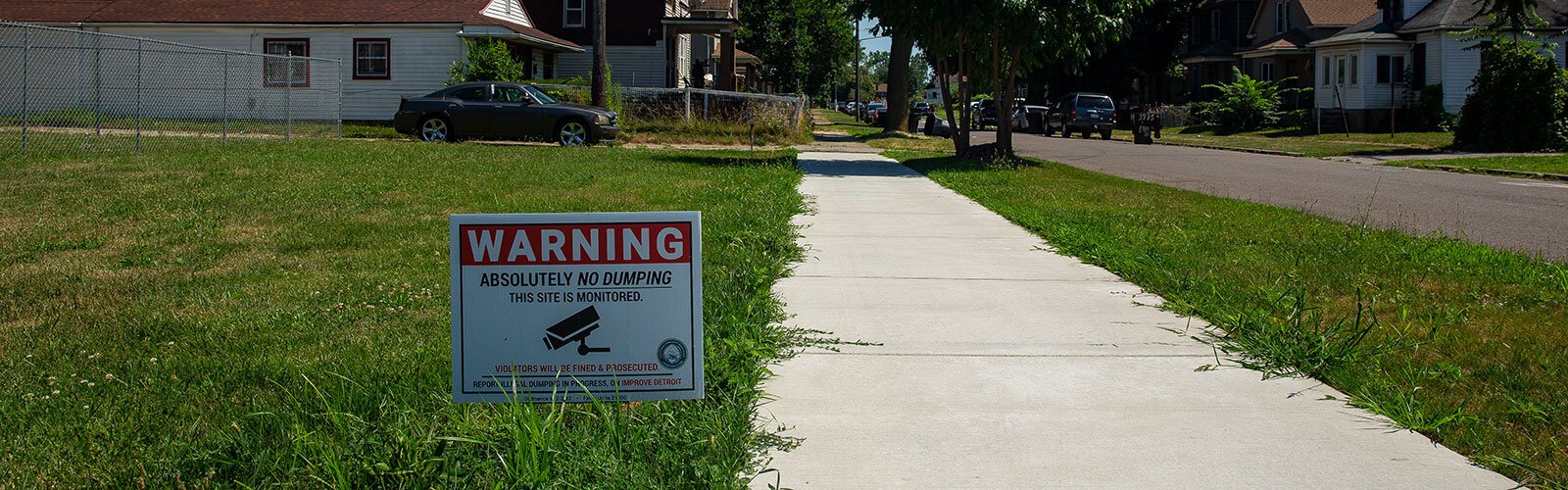 East Side "No Dumping" sign.