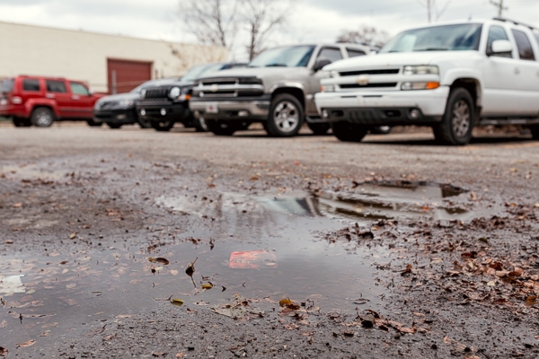 Current, nonporous parking lot at Milton Manufacturing