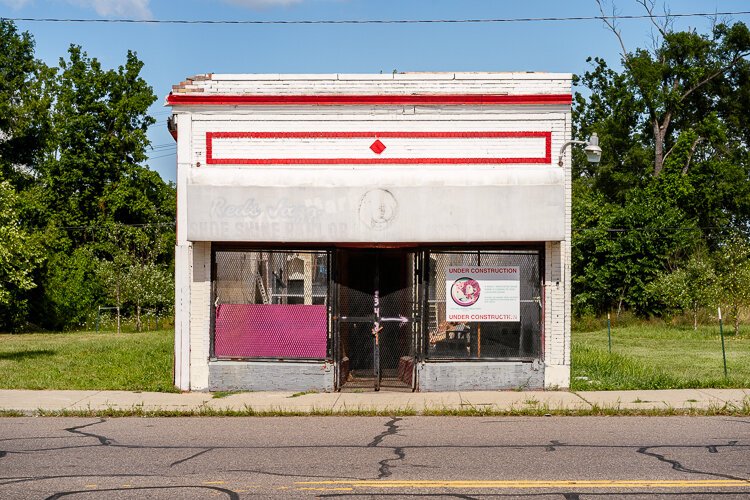 The former Red's Jazz Shoe Shine at 8148 Oakland Ave. in North End  is being redeveloped.