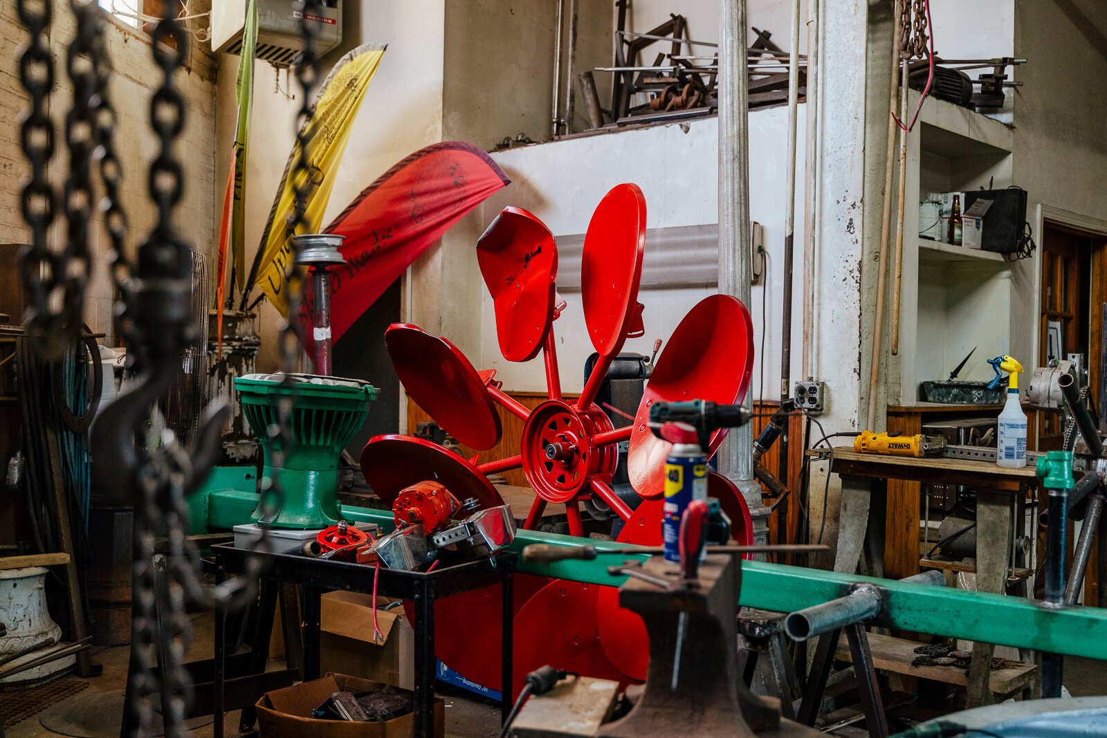 Nielbock's windmills are fashioned out of upcycled materials like light poles and satellite dishes.