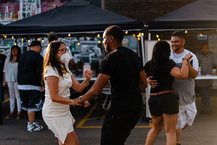 Dancing at Fantazma Market's "Havana Nights" event.